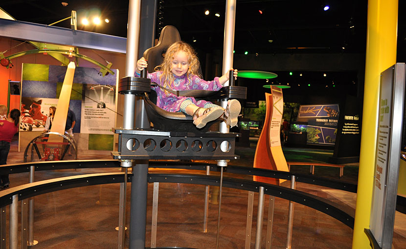 My daughter Reagan in the Air Chair at Discovery Place